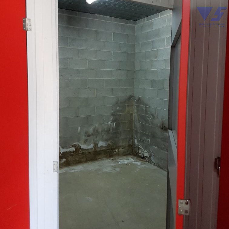 Wet walls and floor in self storage facility