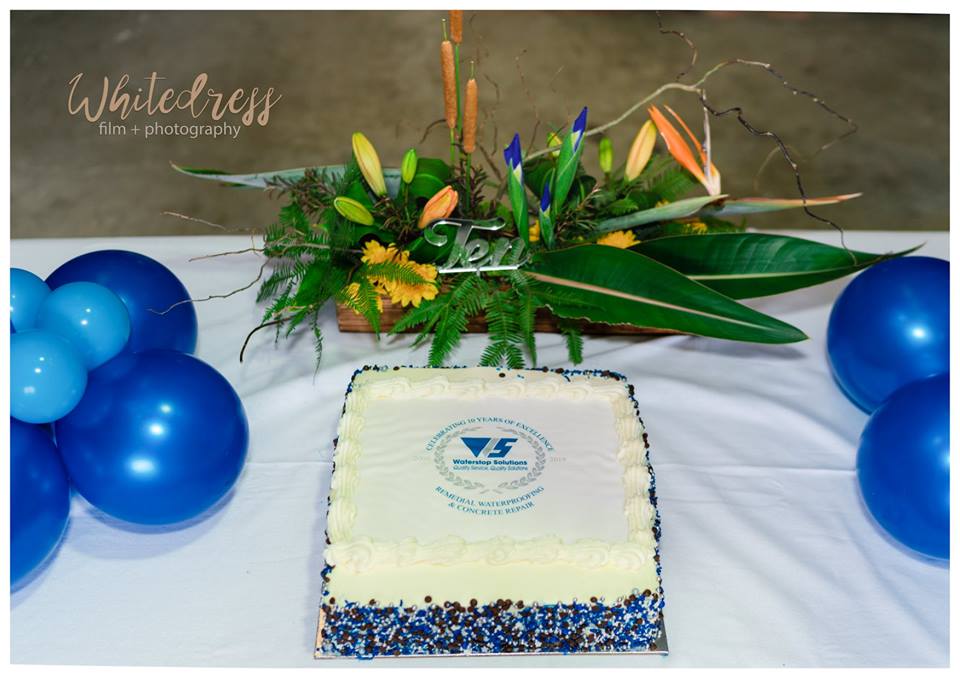Anniversary cake - Waterstop Solutions celebrates trading since 2009. Photo: Whitedress Productions.