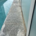 Deteriorated joint seal along pool fence - Waterstop Solutions