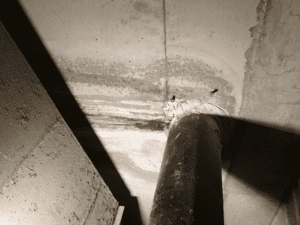Leak sealing injection around leaking pipe penetration - Waterstop Solutions