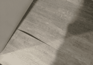 Vinyl flooring lifting - caused by moisture in the substrate