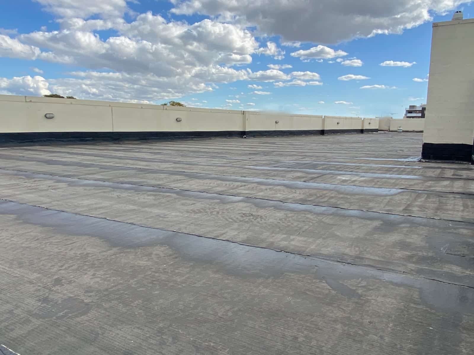 Bituminous torch-on membrane installed on roof top - by Waterstop Solutions NSW