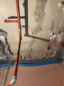 Overhead concrete crack leak sealing injections carried out by Waterstop Solutions